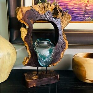 18”H x 13”W abstract sculpture W/ blown glass vase.